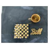 Brass Cup, Bill Belt Buckle, and Chess Set