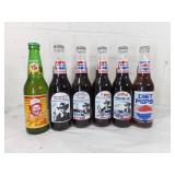 Six Soda Bottles with Logos