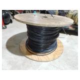 Spool of Black Electrical Wire with Wooden Reel