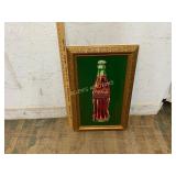 Framed Coca-Cola Bottle Artwork on Green Backdrop
