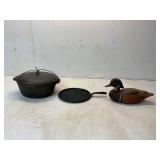 Cast Iron Cookware and Wooden Duck Decoy