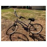 Blue Hybrid Bicycle With Gear System