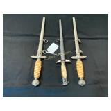 Three Ornamental Daggers with Sheaths