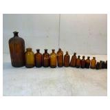 16 Amber Glass Bottles in Varied Sizes