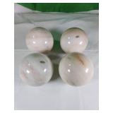 Four Polished Marble Spheres