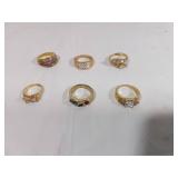 Six Gold-Tone Rings with Stones