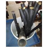 Bucket of Metal and Rubber Hoses