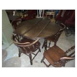 Round Table with Two Leafs and Five Chairs