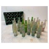 23 Soft Drink Bottles with Plastic Crate