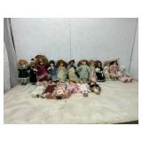 18 Porcelain Dolls with Various Attire