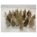 34 Glass Bottles in Varied Shapes