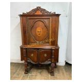 Carved Wood Cabinet with Ornamental Detailing
