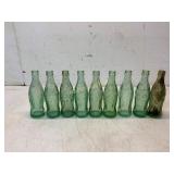 9 Embossed Glass Soda Bottles