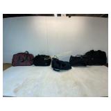 Five Travel Bags in Mixed Materials