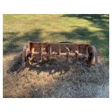 Rusty Agricultural Rotary Tiller Attachment