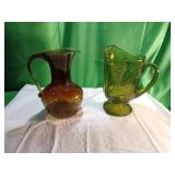 Two-Handed Glass Pitchers in Amber and Green