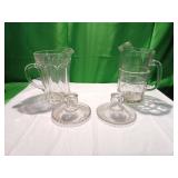 Glass Pitchers and Pair of Candleholders