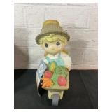 Precious Moments Figurine with Wheelbarrow