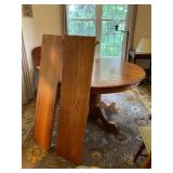 Round Pedestal Dining Table with Leaves