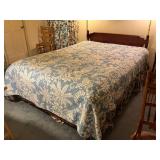 Wooden Full-Size Bed Frame with Blue Quilt