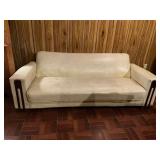 Cream Vinyl Sofa with Wood Accents