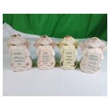 Four Ceramic Cherub Angel Figurines
