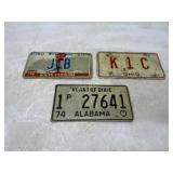 Three Vintage License Plates