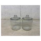Two Clear Glass Storage Jars With Lids