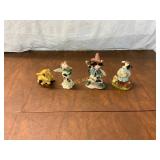 Four Ceramic Cow Figurines