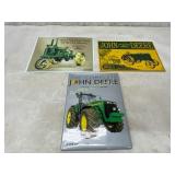 John Deere Book and Two Metal Signs