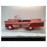 Red Metal Pedal Car with White Accents