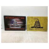 Two Metal ï¿½Donï¿½t Tread on Meï¿½ Signs