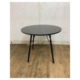 Round Black Table with Three Legs