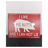 Decorative Red Metal Sign with Pig Motif