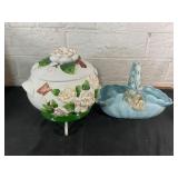 Flower-Adorned Ceramic Jar and Blue Basket