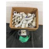 PVC Pipe Fittings and Green Electrical Wire