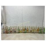 24 Assorted Soda Bottles