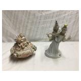 Two Porcelain Figurines with Decorative Details