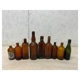 9 Amber and Green Glass Bottles