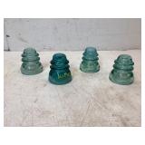 Four Aqua Glass Insulators