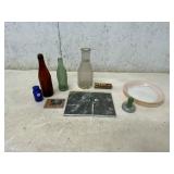 Brown Bottle and Green Coke Bottle