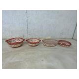 Four Red Patterned Ceramic Serving Bowls