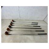 Six Wooden Golf Clubs
