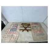 Feed Sack Lot with Wooden Wall Rack