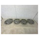 Four Nissan Wheel Covers