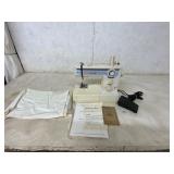 White Electric Sewing Machine Model 672 with Acces