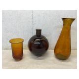 Three Amber Glass Vessels