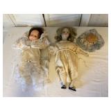 Two Porcelain Dolls with Accessories