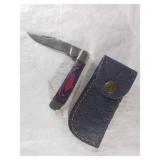 A Pair of Modern Damascus Steel Folding Knife and
