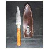 A Damascus Steel Fixed-Blade Knife with Resin Hand